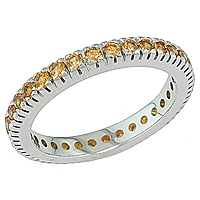 Orange sapphire white gold eternity ring