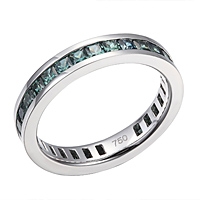 Green sapphire white gold eternity ring