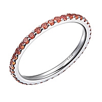 Orange sapphire white gold eternity ring